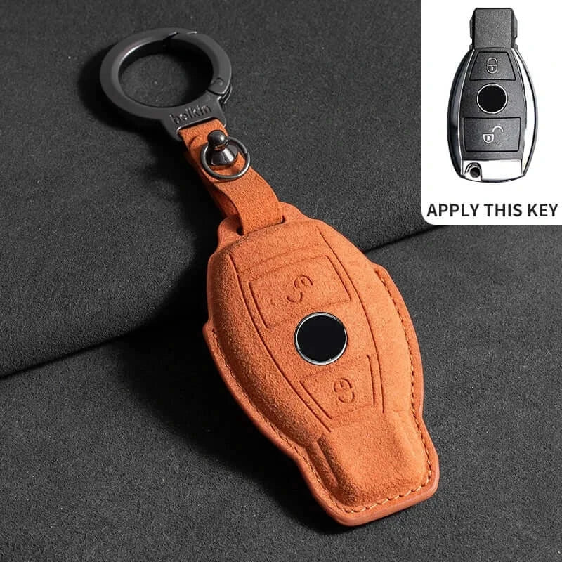 Suede leather key fob case Mercedes Benz in orange color with keychain attached, designed for E Class models.