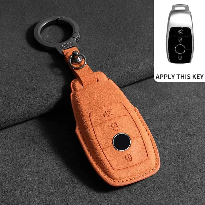 Suede leather key fob case Mercedes Benz in orange color, designed for remote key shells and featuring a keychain attachment.