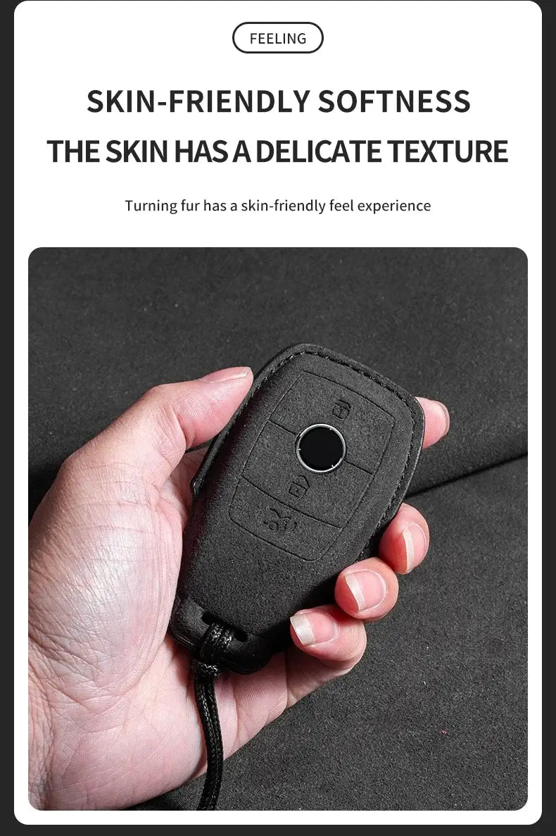 Suede leather key fob case Mercedes Benz held in hand, showcasing skin-friendly softness and delicate texture.